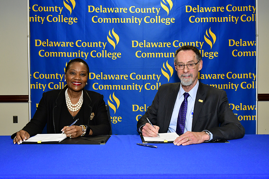 Dr. L. Joy Gates Black and West Chester University President Dr. Christopher M. Fiorentino sign the new West Chester University Bachelor of Science