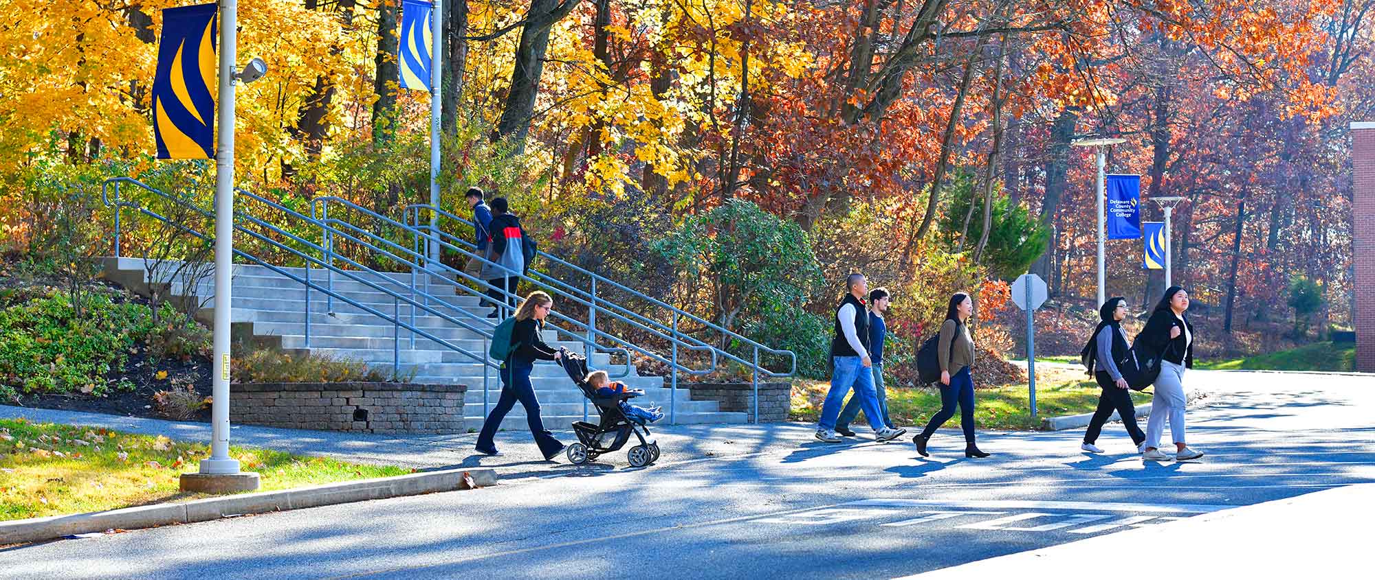 Students walking onto Marple Campus in Fall